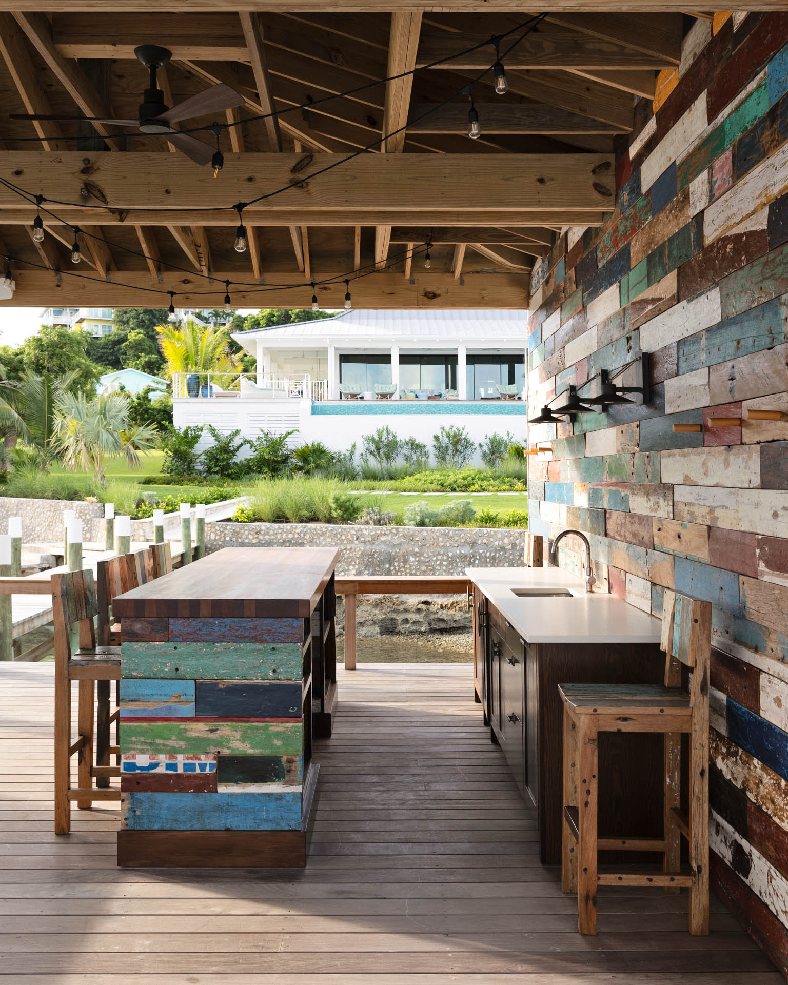 Tropical luxury interior design in Abaco Cay, Bahamas villa by Studio M, blending indoor-outdoor living with island-inspired decor