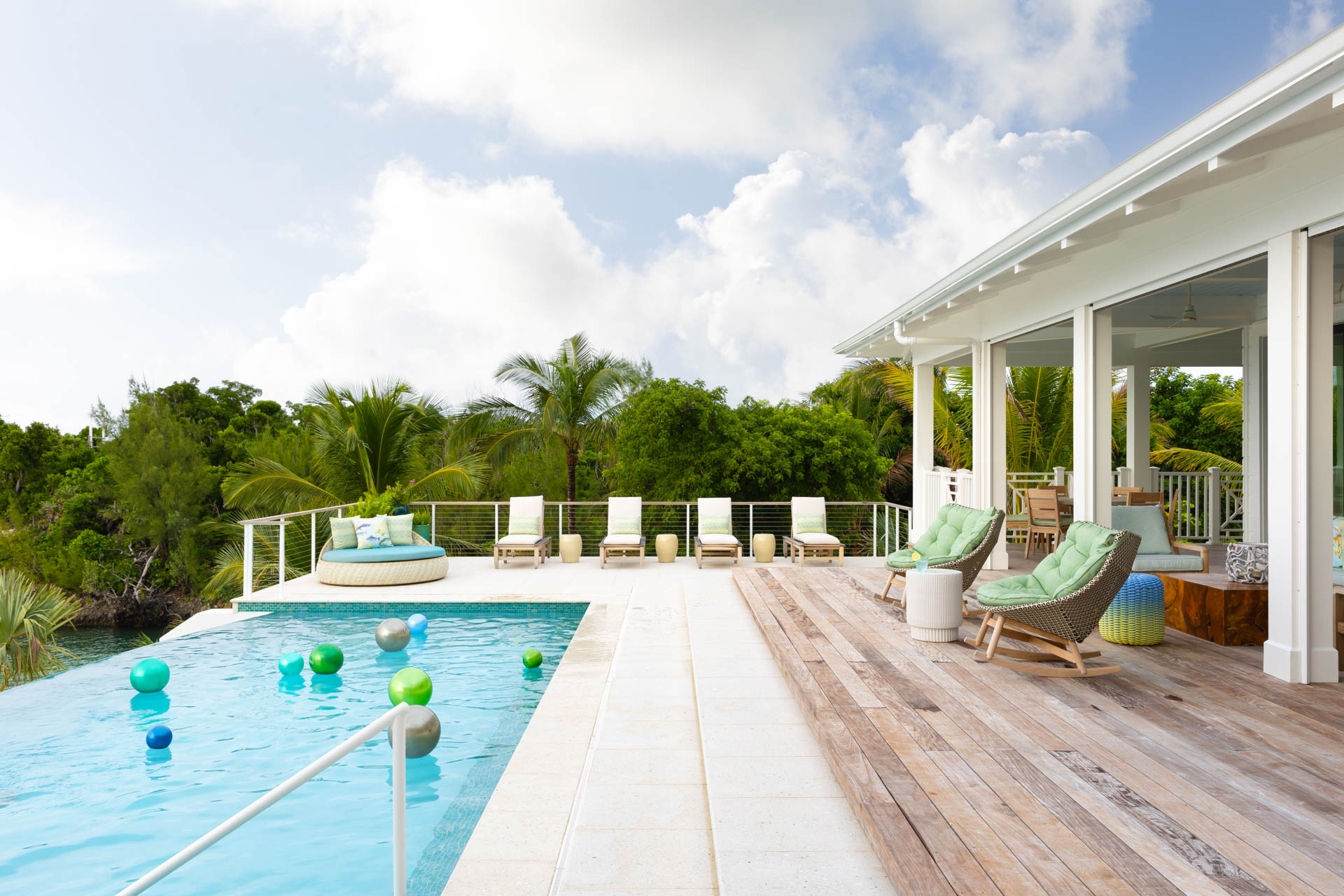 Tropical luxury interior design in Abaco Cay, Bahamas villa by Studio M, blending indoor-outdoor living with island-inspired decor