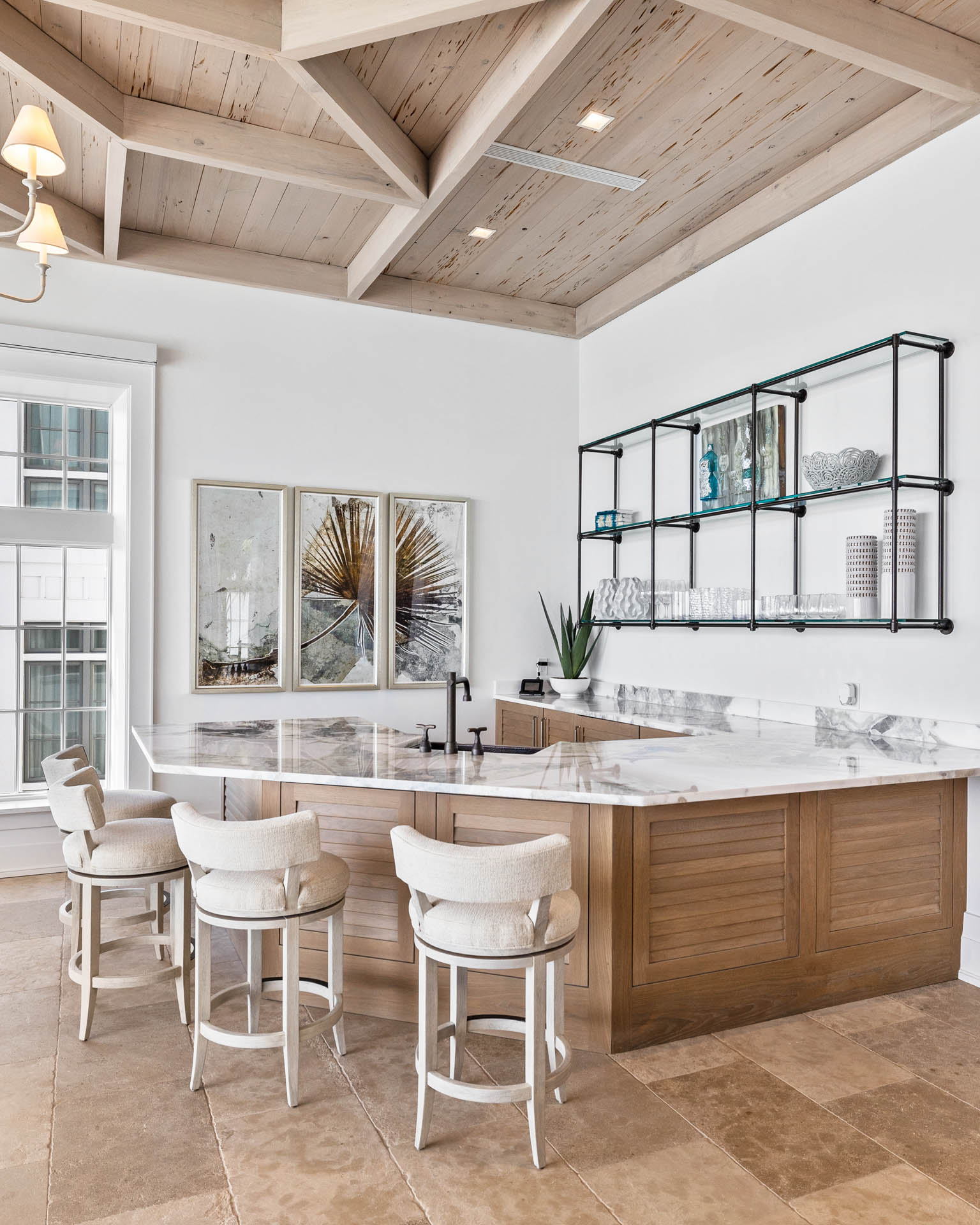 Celebrity-approved Destin interior design by Studio M features hand-hewn beams and innovative materials across 14,000 square feet of coastal luxury