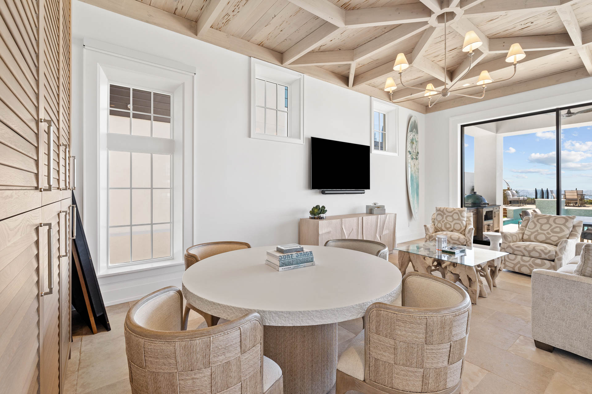 Celebrity-approved Destin interior design by Studio M features hand-hewn beams and innovative materials across 14,000 square feet of coastal luxury