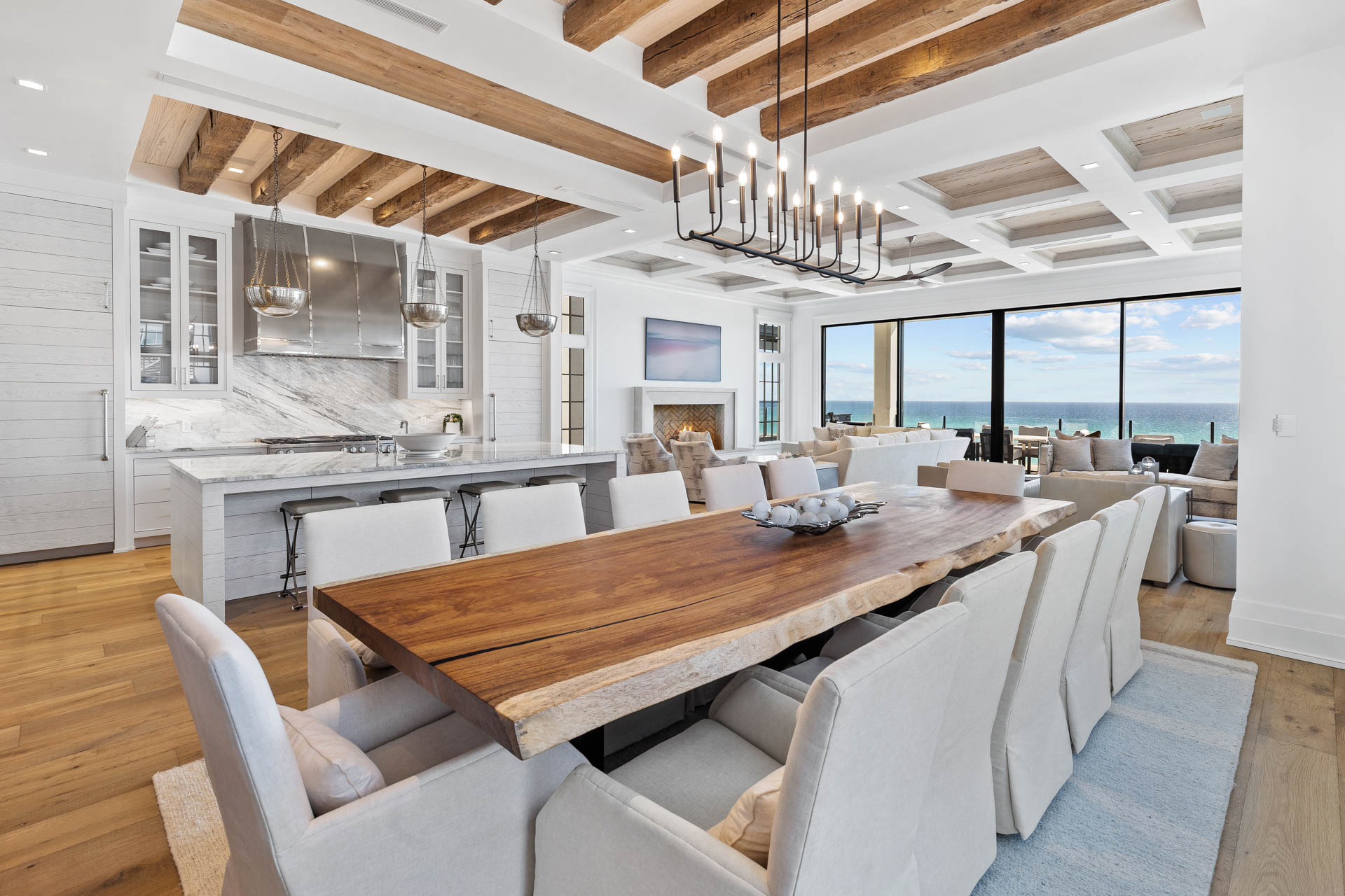 Celebrity-approved Destin interior design by Studio M features hand-hewn beams and innovative materials across 14,000 square feet of coastal luxury