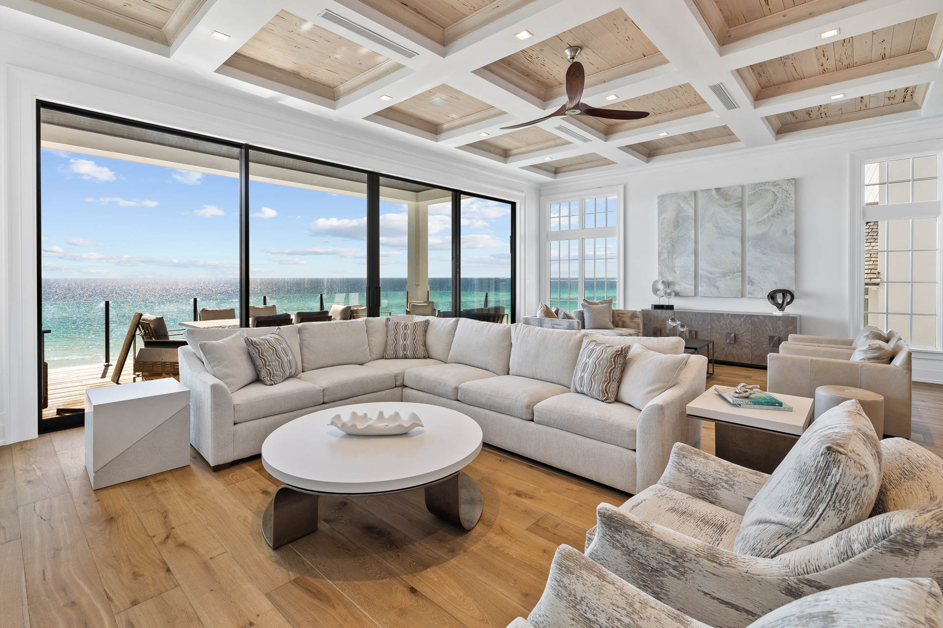 Celebrity-approved Destin interior design by Studio M features hand-hewn beams and innovative materials across 14,000 square feet of coastal luxury