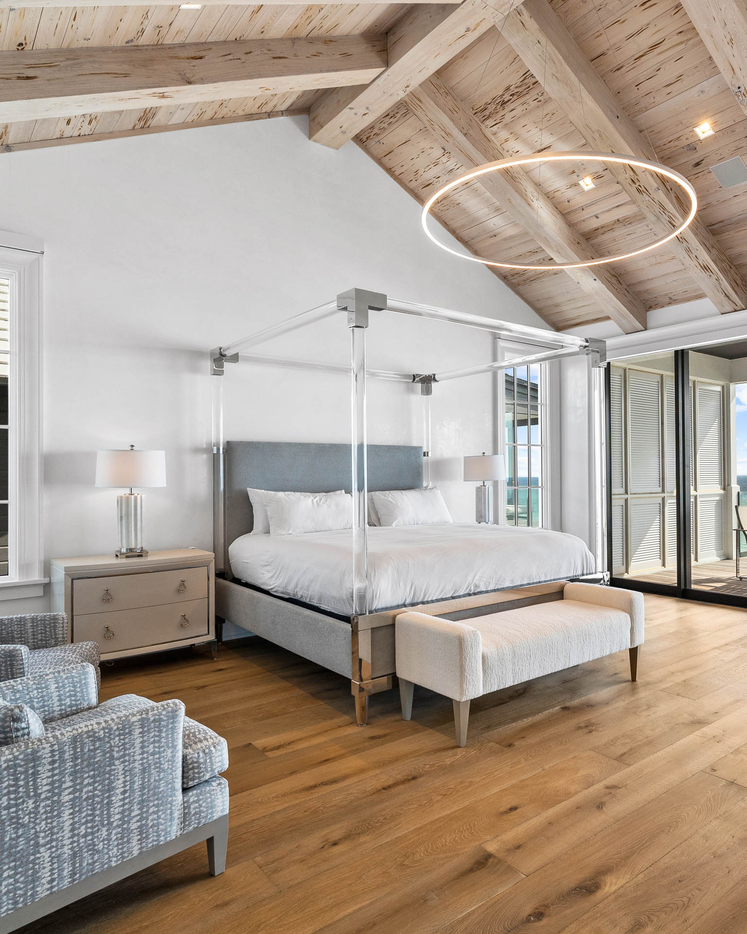 Celebrity-approved Destin interior design by Studio M features hand-hewn beams and innovative materials across 14,000 square feet of coastal luxury